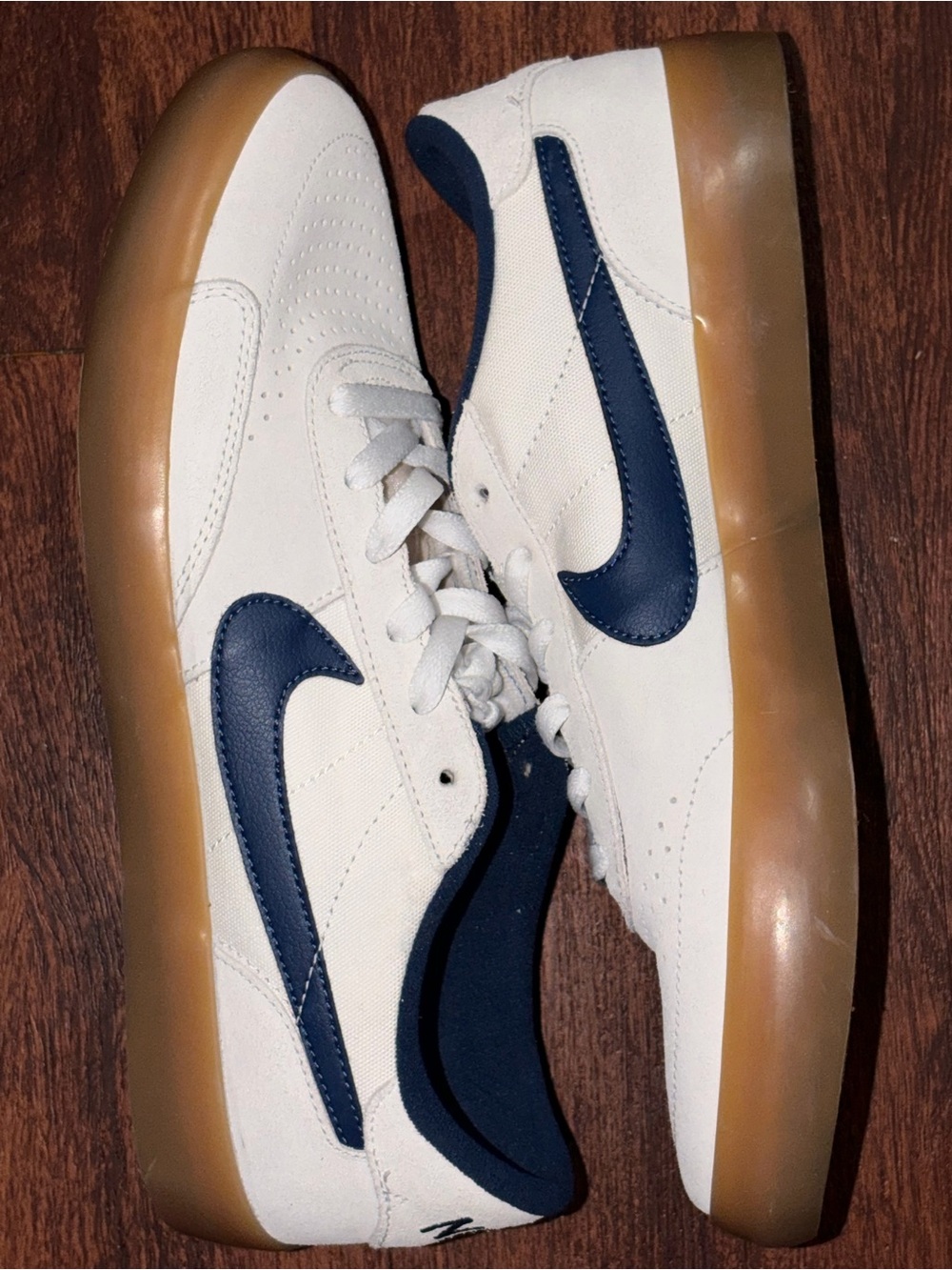 Nike size 10 Men’s White & Navy Low-Top Sneakers with Gum Sole